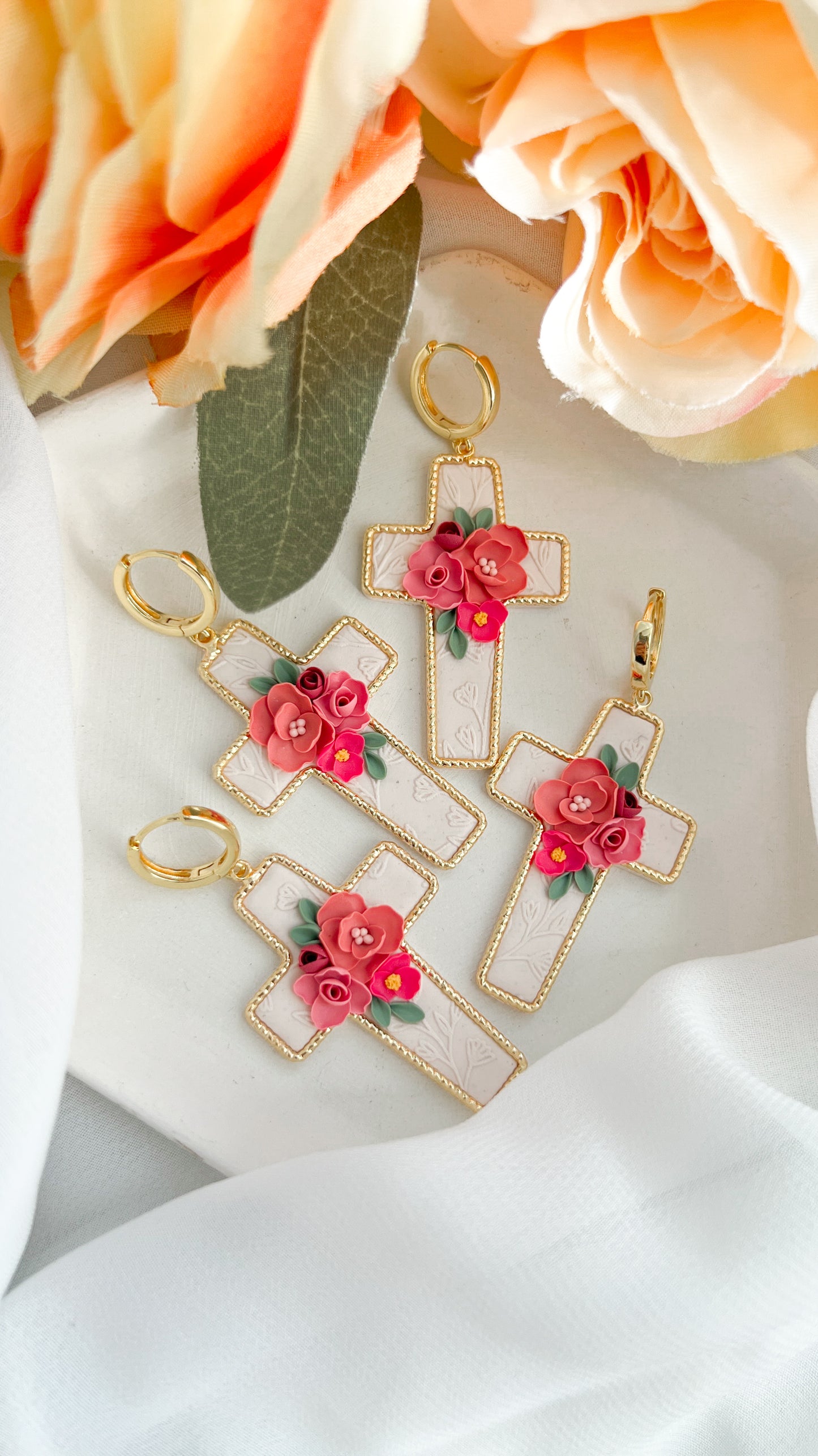Gold Rimmed Floral Cross Earrings